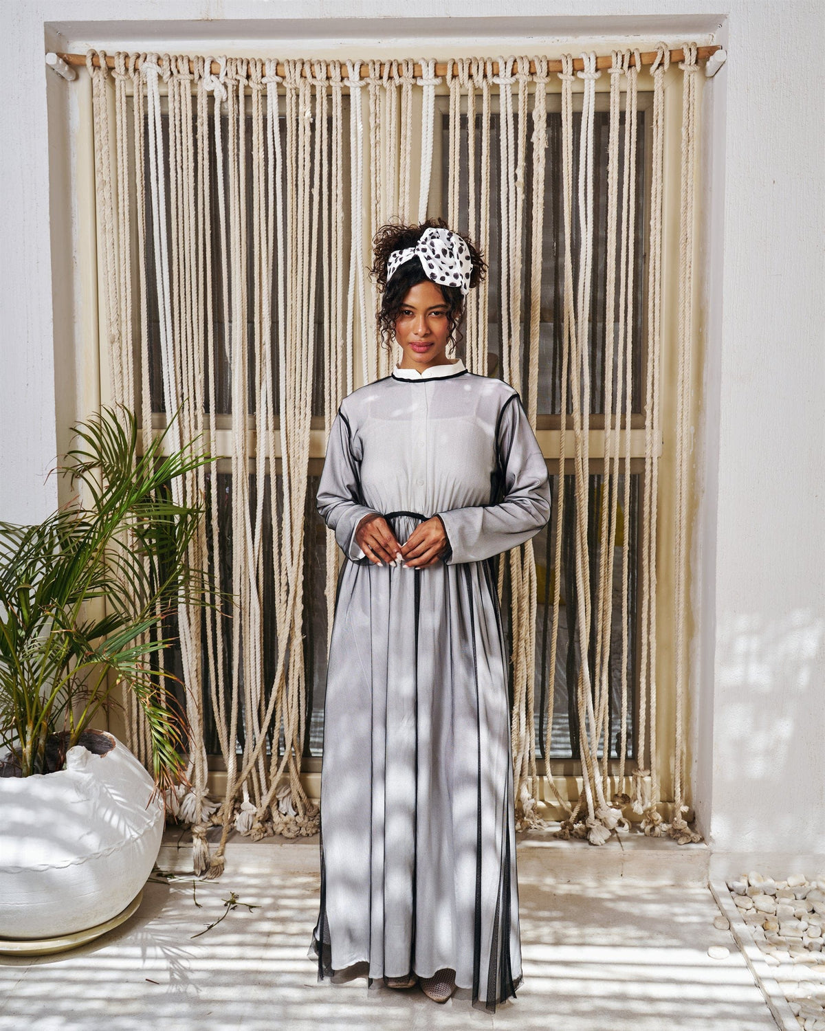 Illusion long sleeve dress in black with chiffon overlay