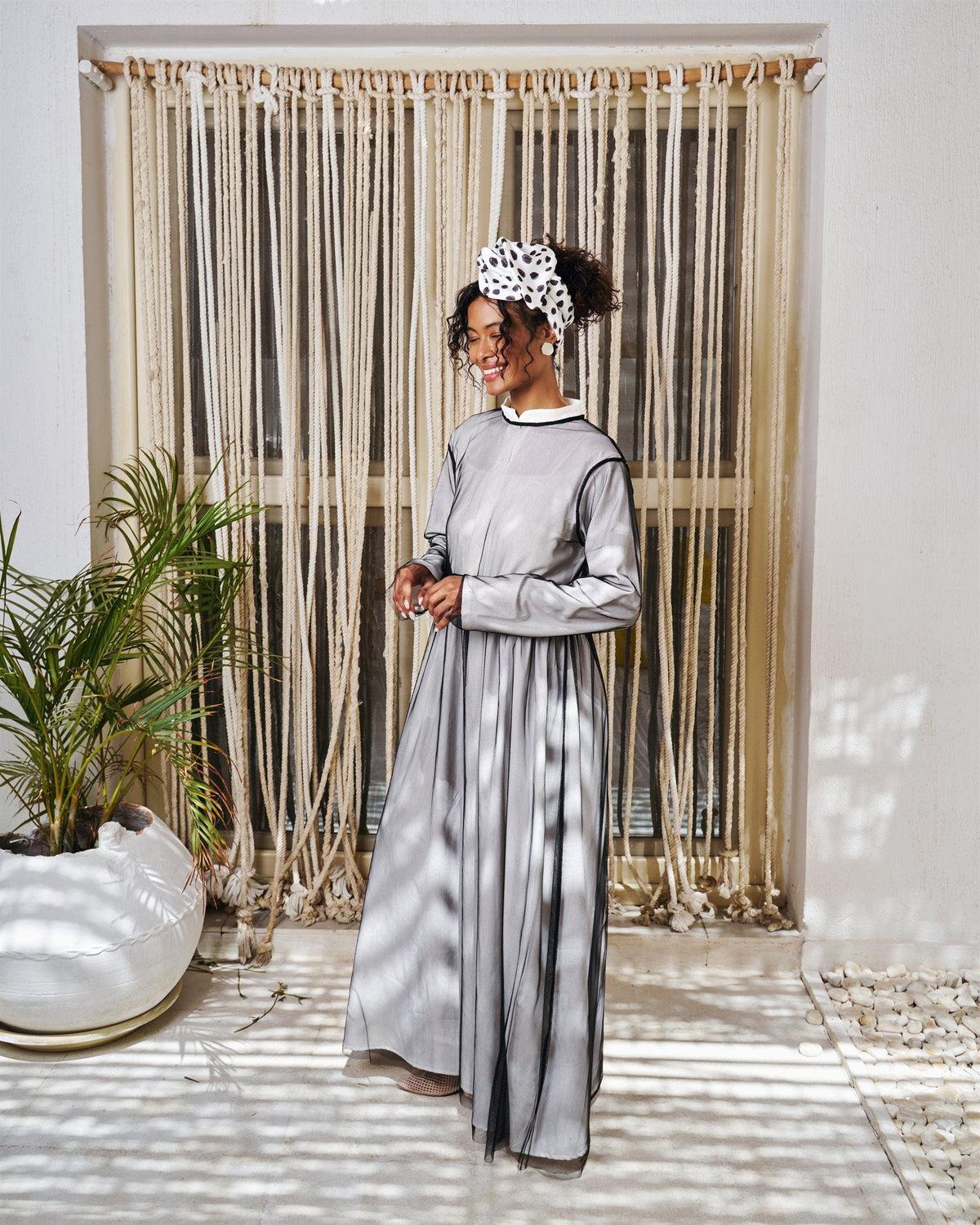 Illusion long sleeve dress in black with chiffon overlay