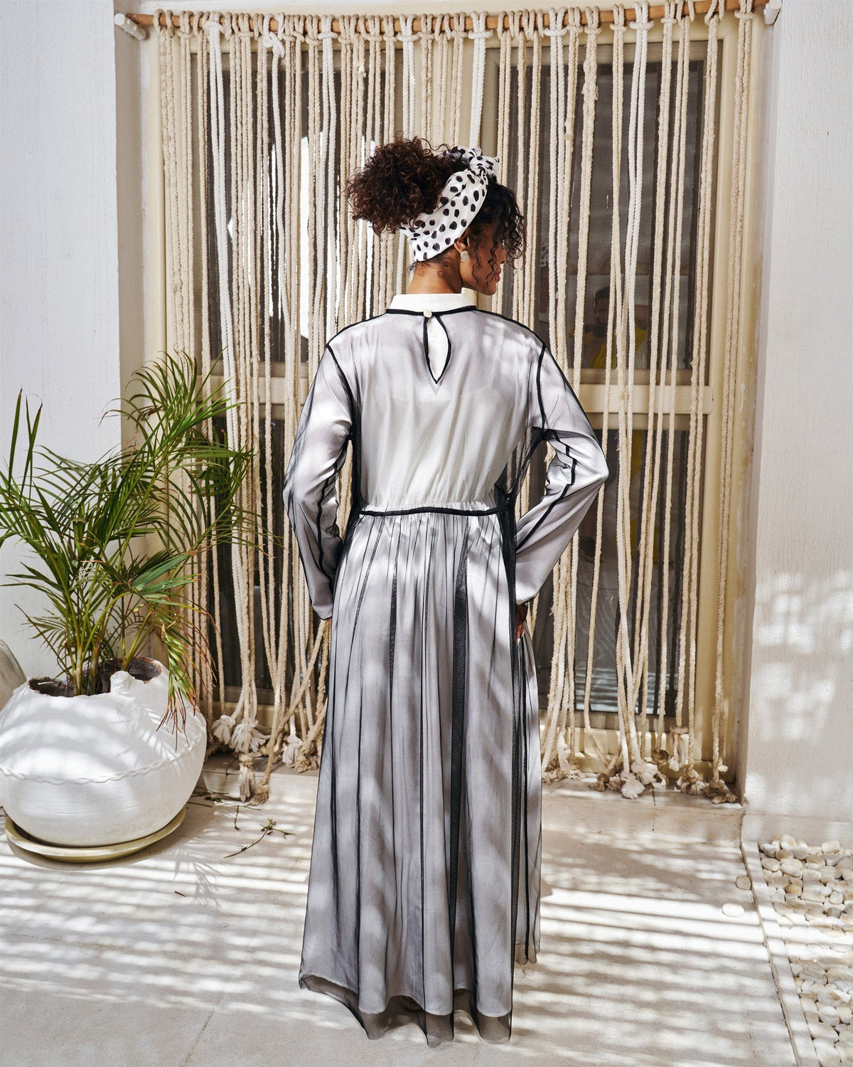 Illusion long sleeve dress in black with chiffon overlay