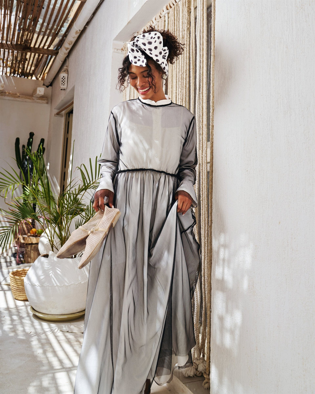 Illusion long sleeve dress in black with chiffon overlay
