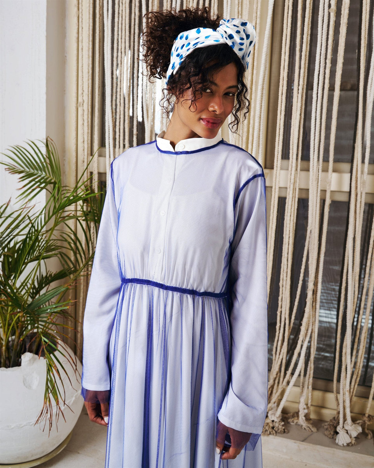 Illusion long sleeve dress in blue with chiffon overlay