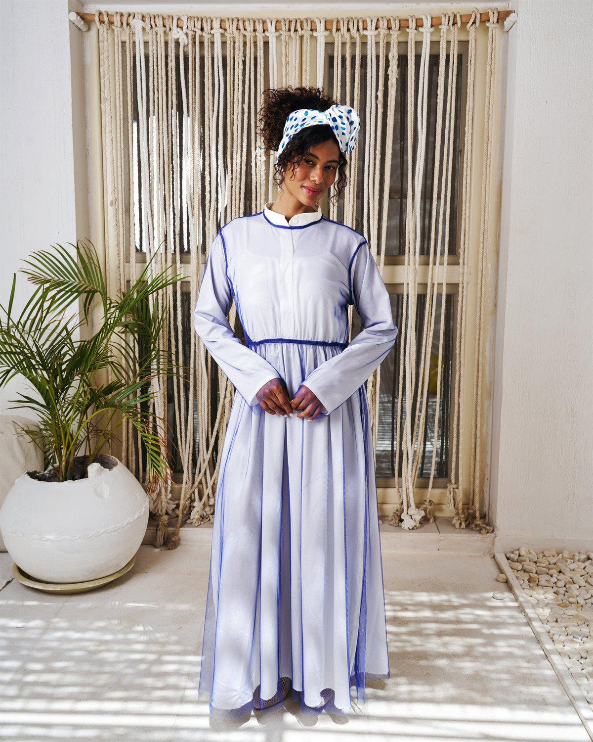 Illusion long sleeve dress in blue with chiffon overlay
