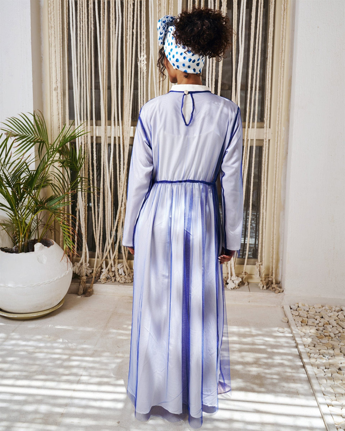 Illusion long sleeve dress in blue with chiffon overlay